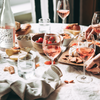Faux Wine Mélange Rosé served chilled in a wine glass with food
